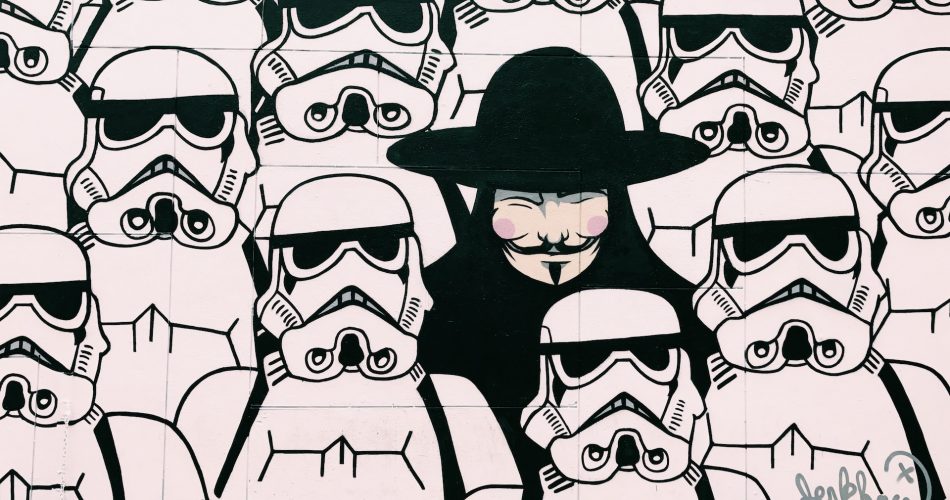 guy fawks surrounded by star wars stormtrooper