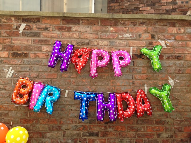 purple happy birthday wall decor
